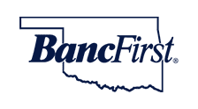 A blue and white logo of bancfirst.